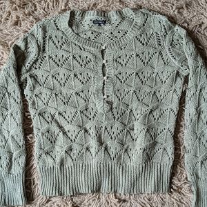 Pale green sweater